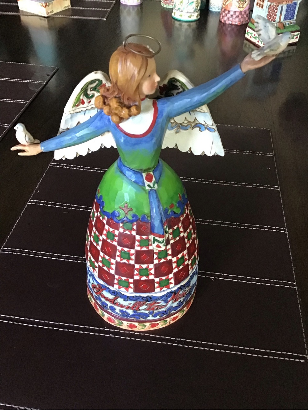 Jim Shore Hand-Painted Peace and Go Angel Figurine in Green, Red, Blue and White